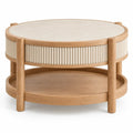 Table basse ronde beige et crème à ceinture striée et plateau inférieur